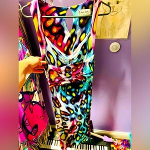 Most of these dresses are made in Italy. About a size 8 can fit these dresses.